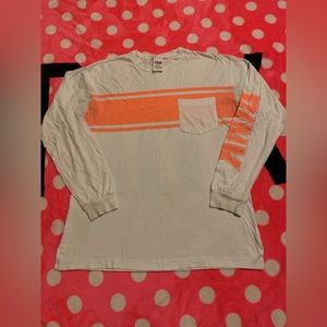 Victoria’s Secret Pink long sleeve tea with orange print size Xs